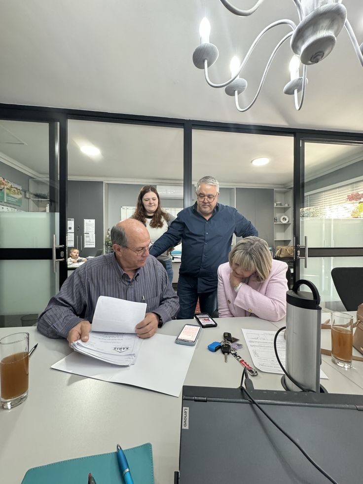 Zorventa advisors reviewing documents with clients